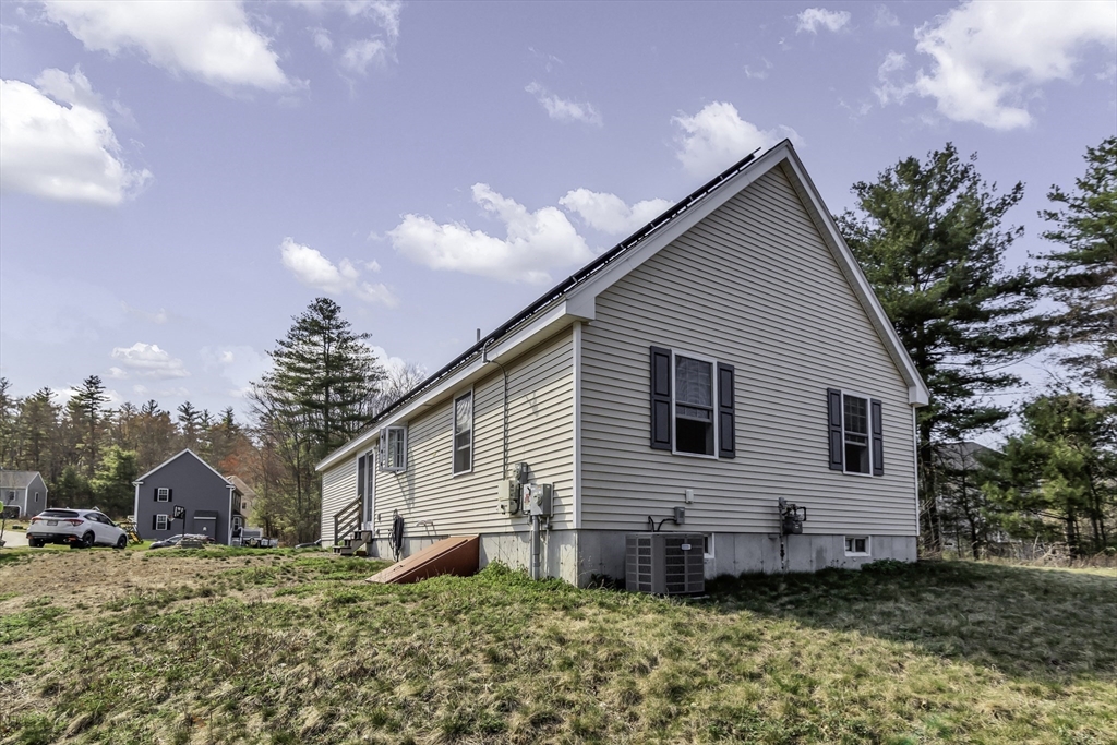 1 Lois Lane Townsend, MA 01469 - Photo 33 of 38 a view of a house with a yard