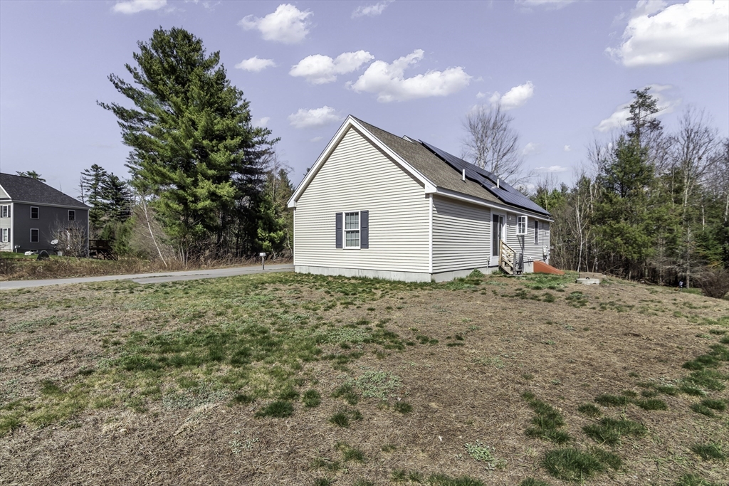 1 Lois Lane Townsend, MA 01469 - Photo 34 of 38 a view of a house with a yard