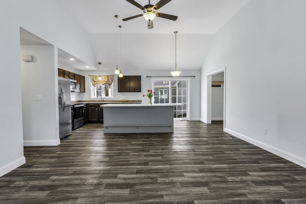 1 Lois Lane Townsend, MA 01469 - Photo 7 of 38 a view of kitchen and kitchen with microwave