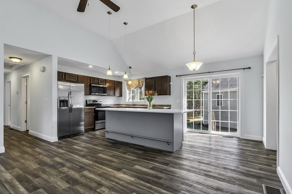 1 Lois Lane Townsend, MA 01469 - Photo 9 of 38 a view of kitchen with stainless steel appliances granite countertop cabinets and wooden floor