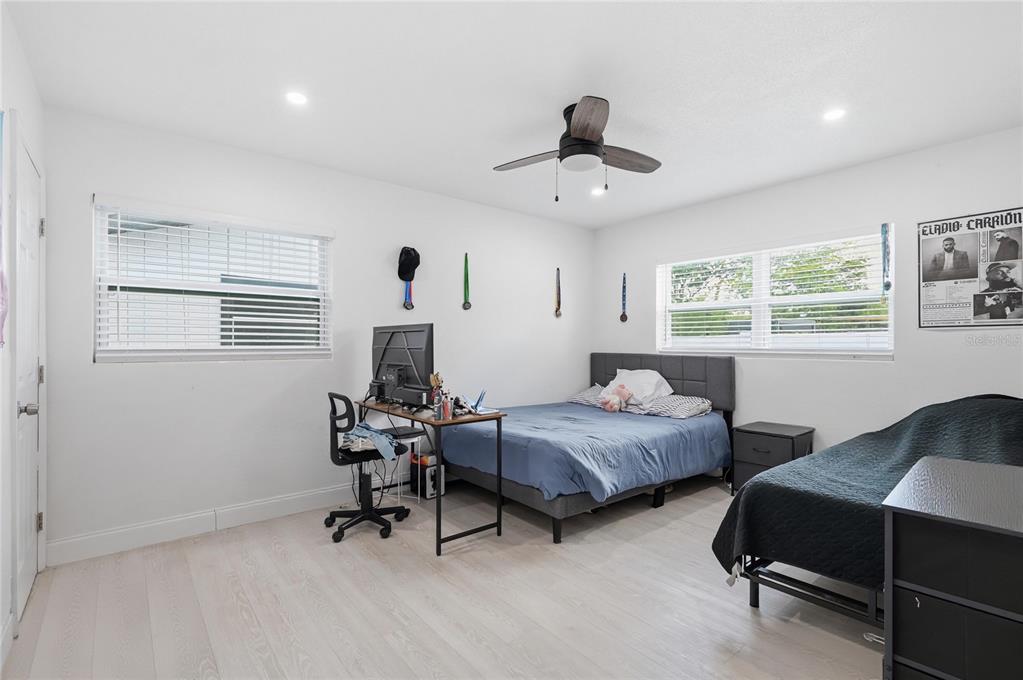 1946 Strathaven Road Winter Park, FL 32792 - Photo 11 of 37 a bedroom with two beds and a desk