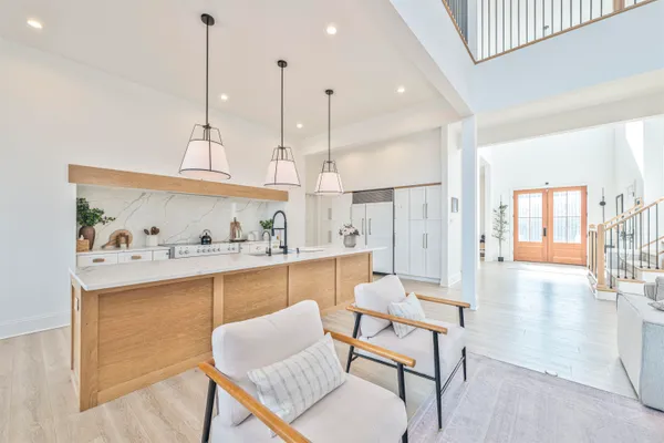 a view of a kitchen and dining room