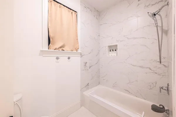 a bathroom with a bathtub