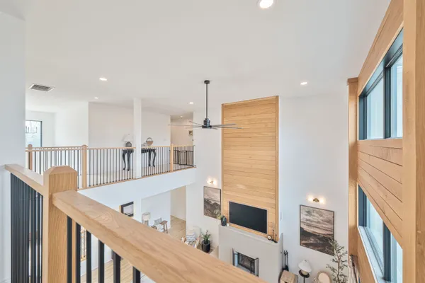 a view of living room with furniture and fireplace
