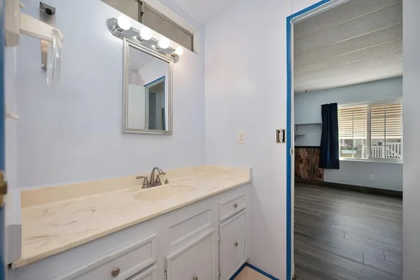a bathroom with a shower and toilet