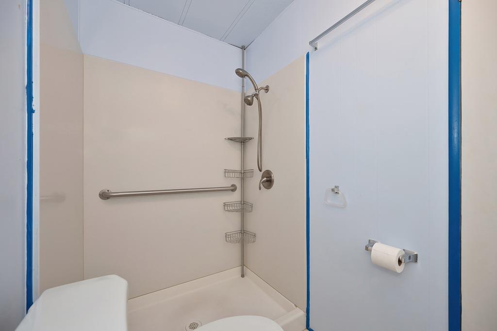 2874 Hidden Springs Circle Placerville, CA 95667 - Photo 14 of 41 a bathroom with a shower and toilet