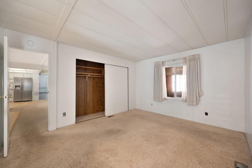 2874 Hidden Springs Circle Placerville, CA 95667 - Photo 30 of 41 a view of an empty room with closet and a window