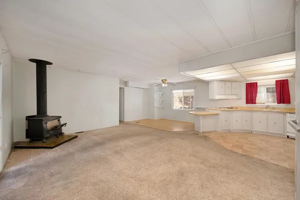 a view of kitchen with cabinets