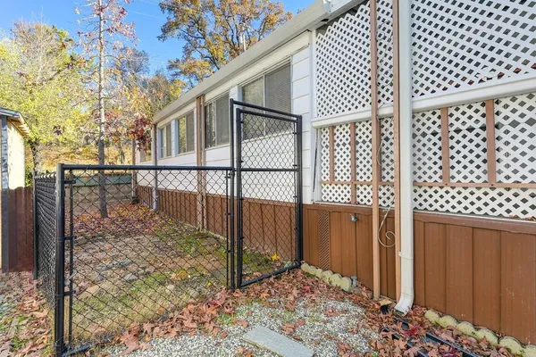 a view of a porch with wooden floor and stairs