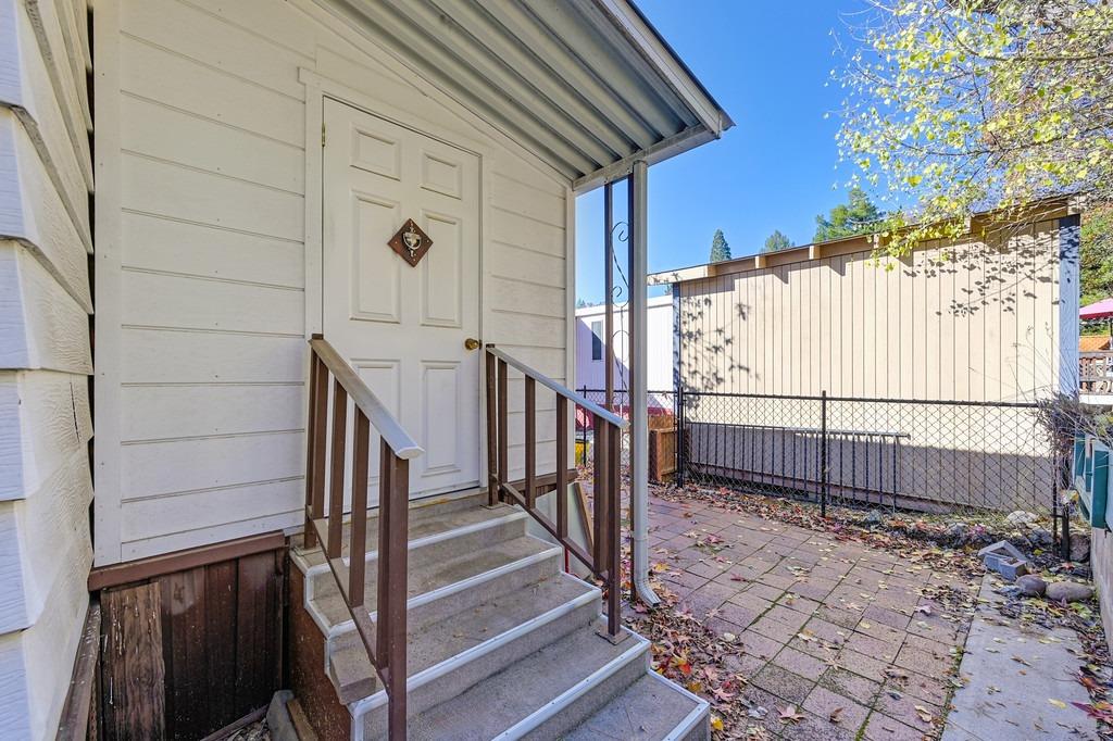 2874 Hidden Springs Circle Placerville, CA 95667 - Photo 41 of 41 a view of a porch with wooden floor and stairs