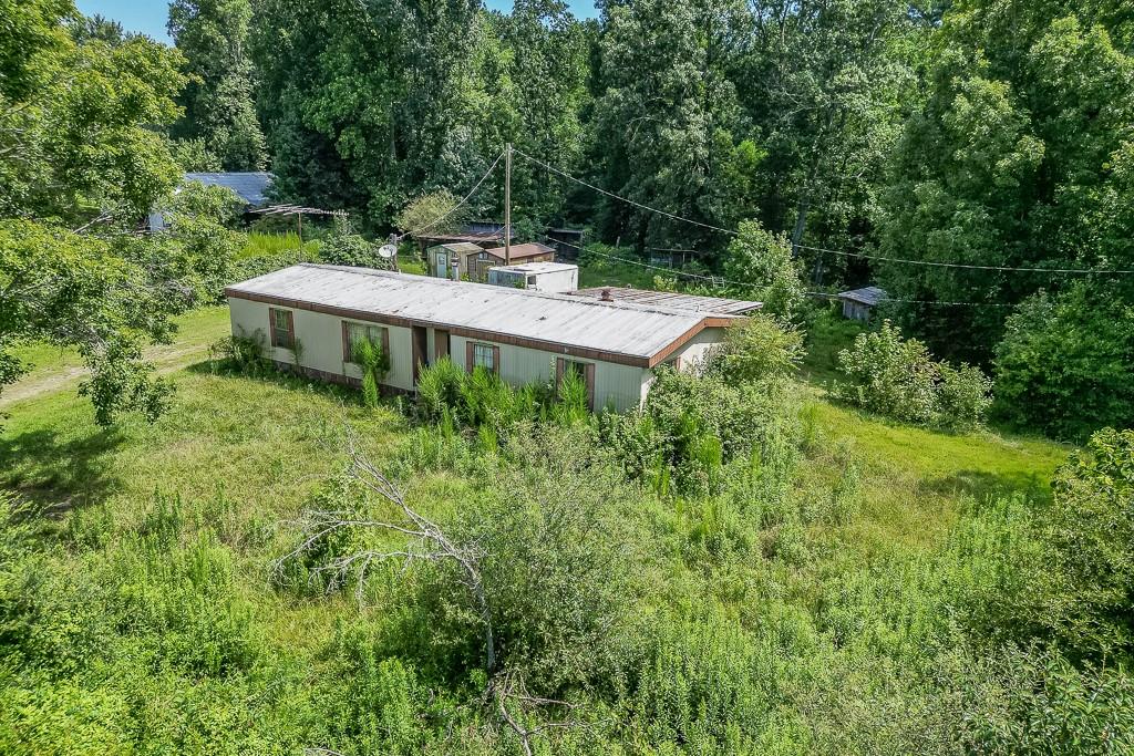 3340 Chamblee Gap Road Cumming, GA 30040 - Photo 11 of 15 a backyard of a house with a table and chairs