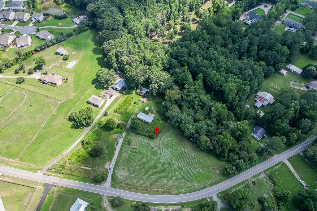 3340 Chamblee Gap Road Cumming, GA 30040 - Photo 2 of 15 an aerial view of a residential houses with outdoor space