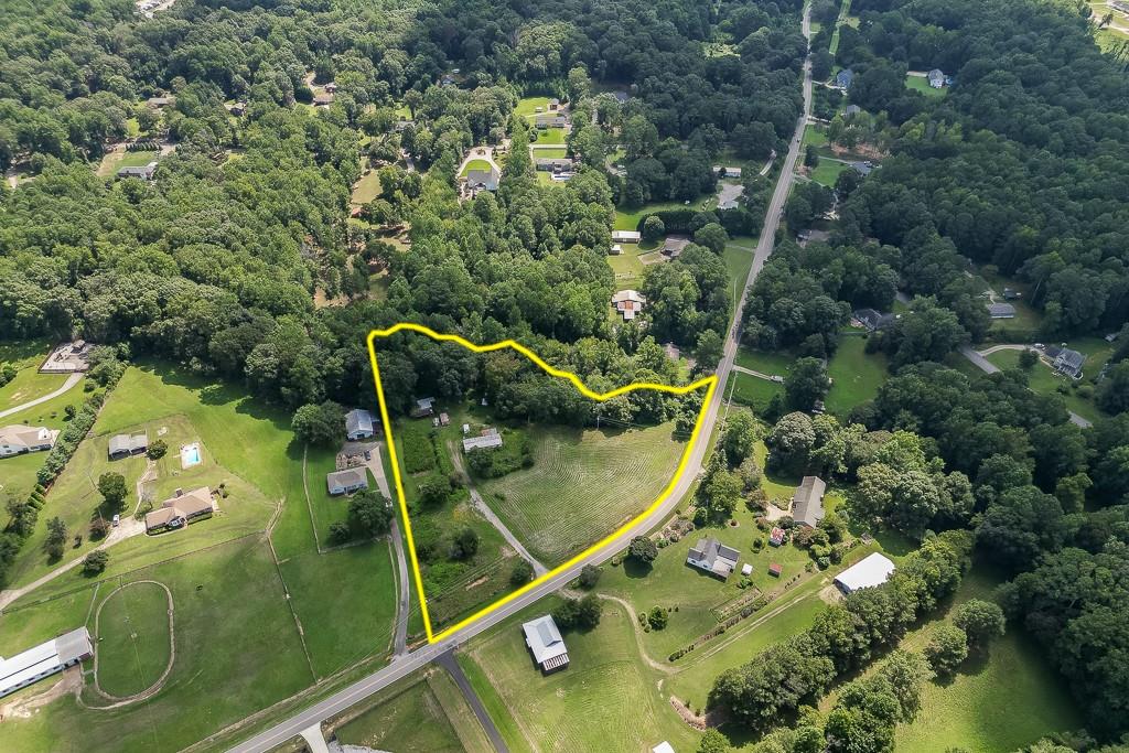3340 Chamblee Gap Road Cumming, GA 30040 - Photo 4 of 15 an aerial view of a residential houses with outdoor space and trees