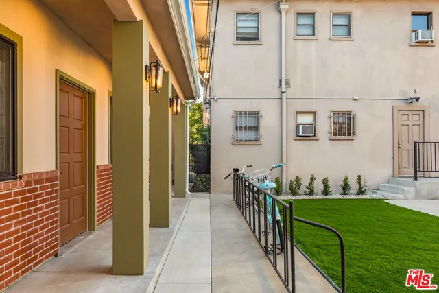 a balcony view with outdoor seating