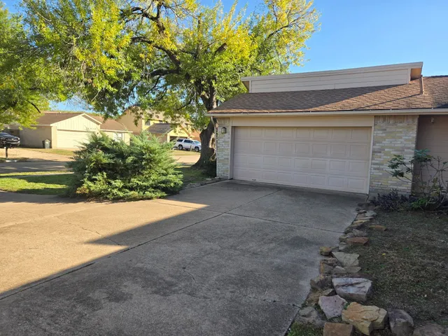 a view of backyard and entertaining space