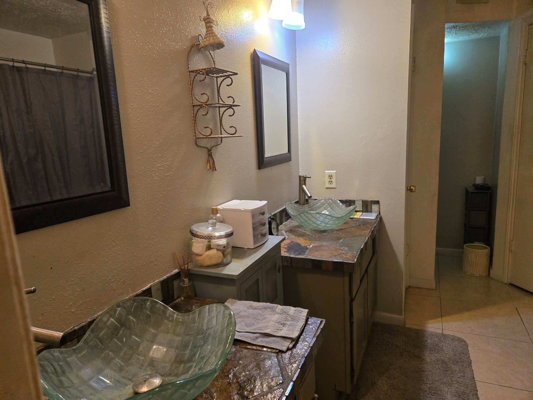 11615 Stone Bridge Drive Houston, TX 77064 - Photo 4 of 14 a bathroom with a granite countertop sink a toilet and mirror