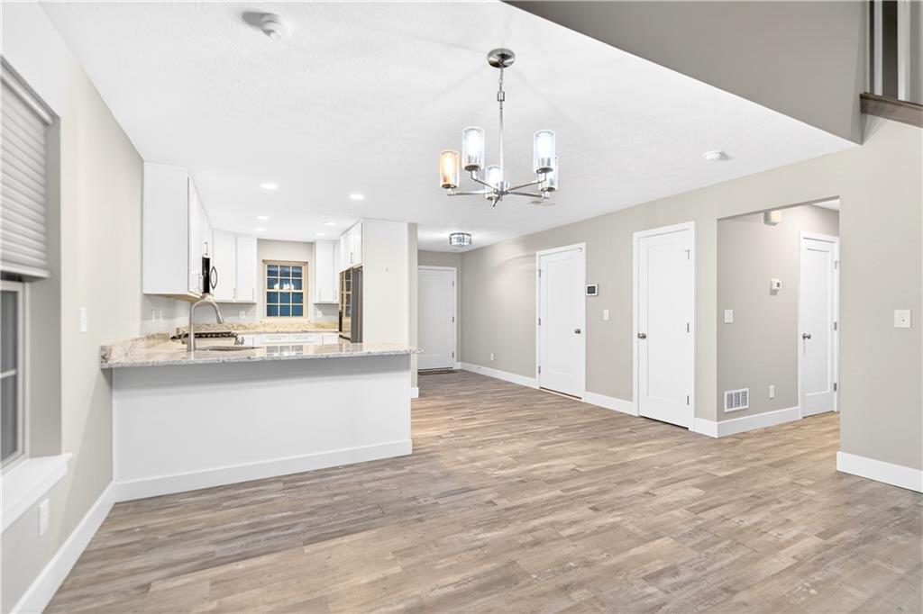 734 Sandstone Way Rostraver Township, PA 15012 - Photo 13 of 50 There's a more formal dining area right off of the kitchen.