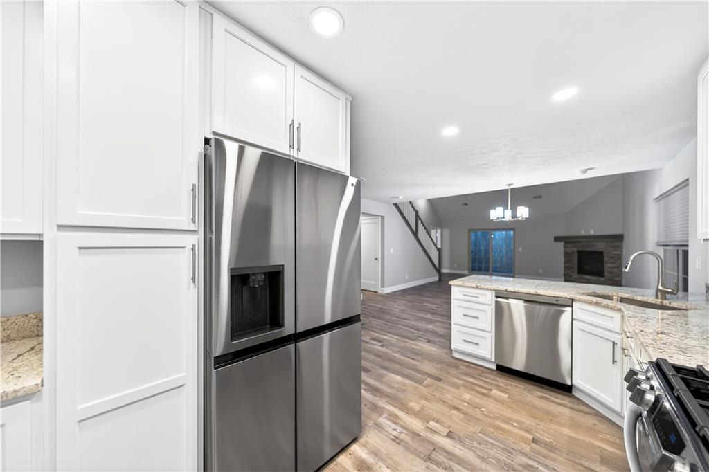 734 Sandstone Way Rostraver Township, PA 15012 - Photo 9 of 50 The open concept floor plan makes entertaining seamless!