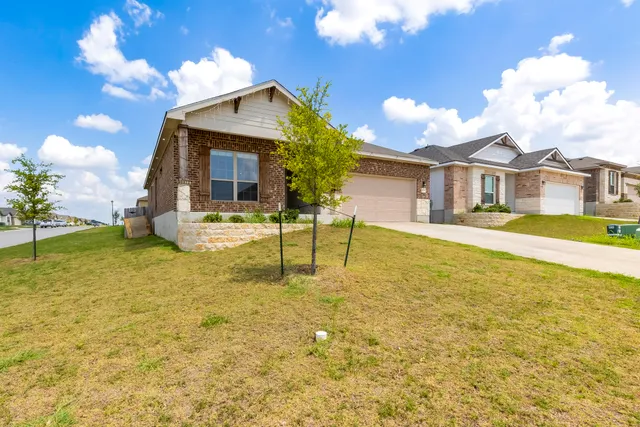 a house view with a swimming pool