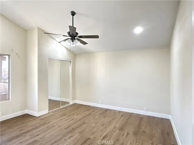 a view of a chandelier fan in a room