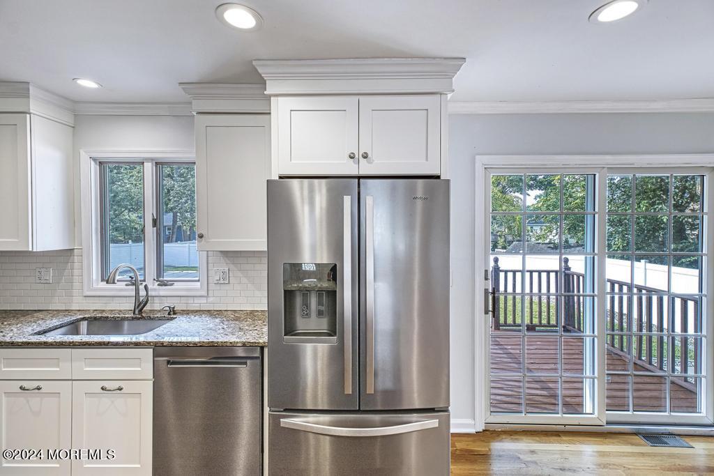 120 Frede Drive Brick, NJ 08724 - Photo 13 of 55 a kitchen with stainless steel appliances granite countertop a refrigerator and a sink