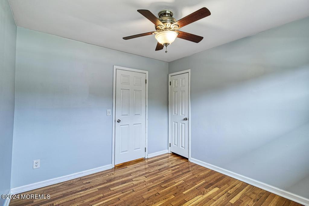 120 Frede Drive Brick, NJ 08724 - Photo 22 of 55 a view of an empty room with wooden floor