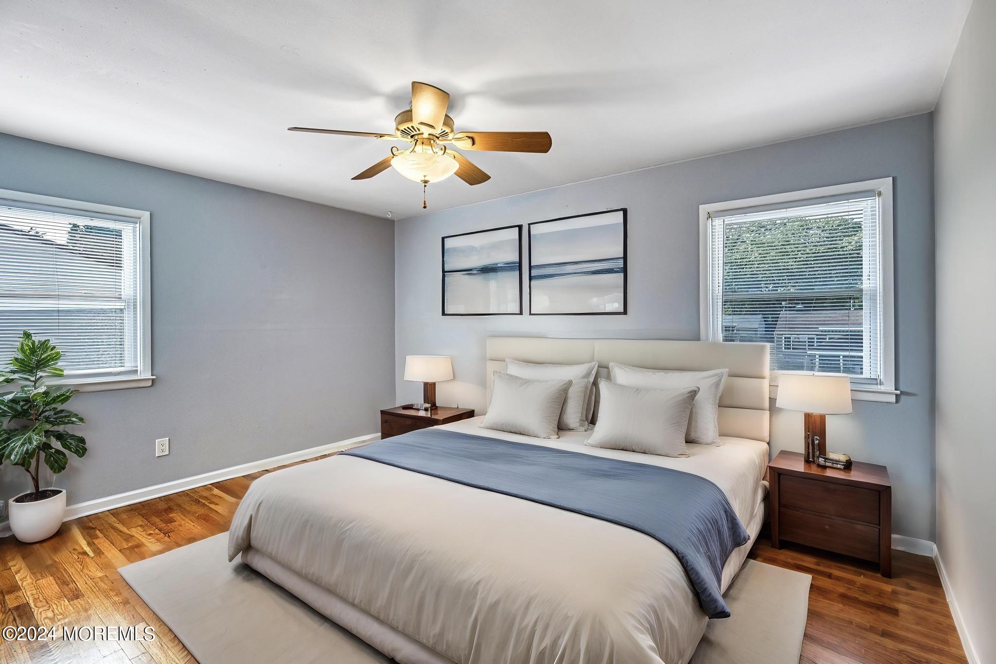 120 Frede Drive Brick, NJ 08724 - Photo 25 of 55 a bedroom with a bed and wooden floor