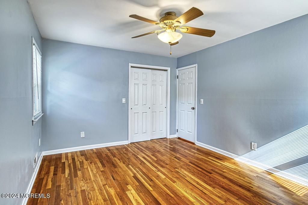 120 Frede Drive Brick, NJ 08724 - Photo 27 of 55 a bedroom with a bed and a chandelier