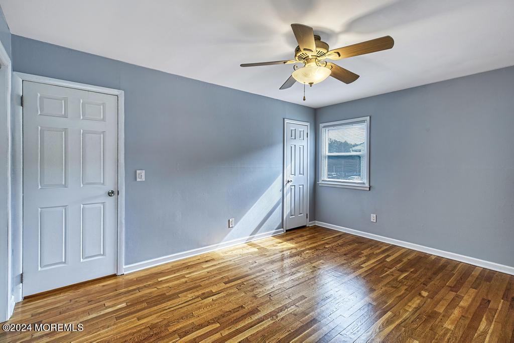 120 Frede Drive Brick, NJ 08724 - Photo 29 of 55 a view of an empty room with a ceiling fan