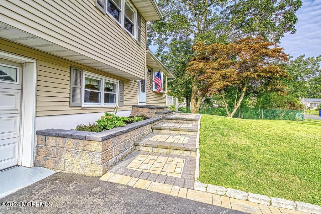 120 Frede Drive Brick, NJ 08724 - Photo 3 of 55 a front view of a house with garden