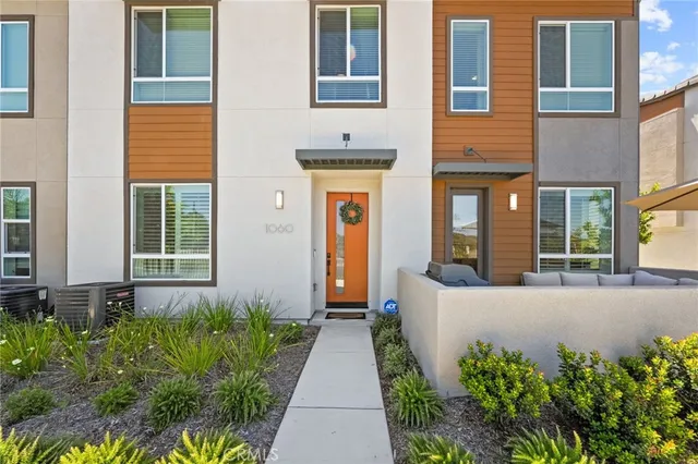 a front view of a house having yard