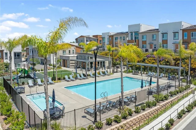 a view of a chairs and table in patio