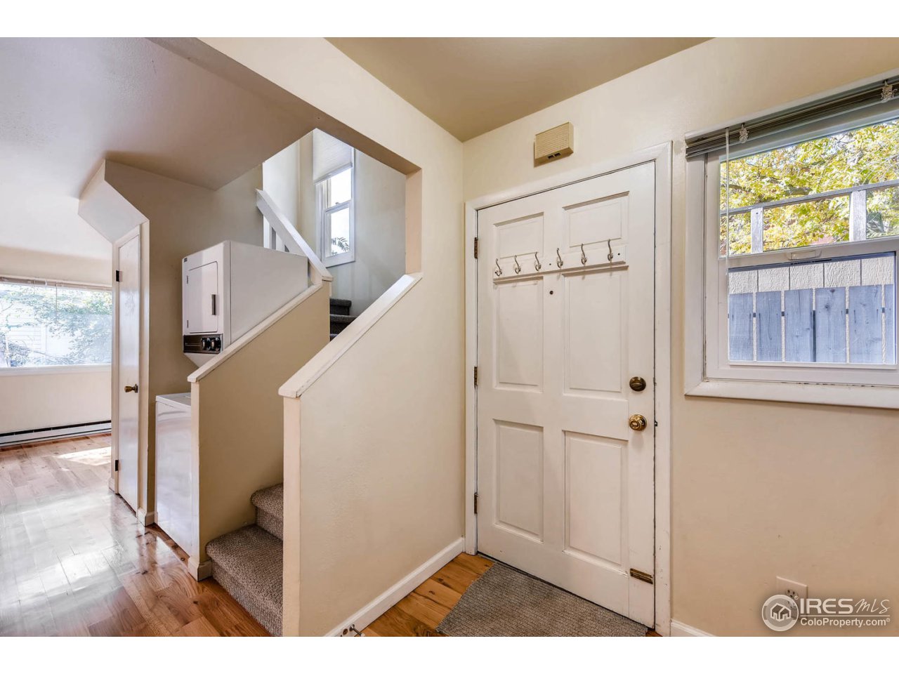 1623 18th Street Boulder, CO 80302 - Photo 9 of 11 a view of a livingroom with furniture and windows