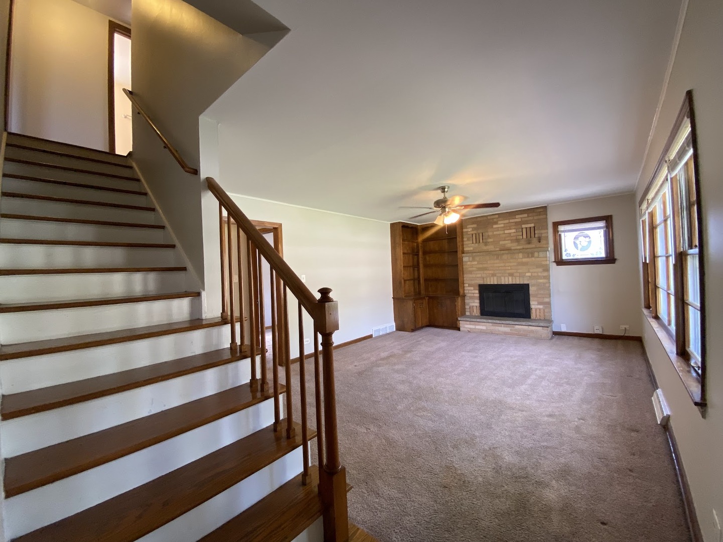 3003 Longfellow Avenue Hazel Crest, IL 60429 - Photo 5 of 19 a view of empty room with fireplace and windows