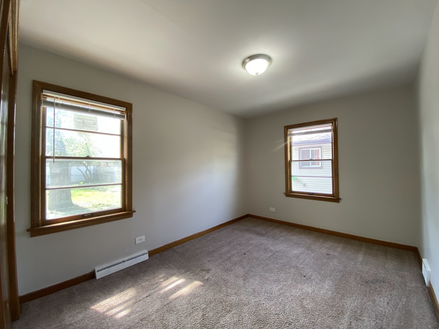 3003 Longfellow Avenue Hazel Crest, IL 60429 - Photo 8 of 19 an empty room with a window