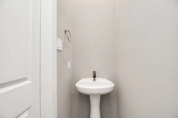 a kitchen with a sink and a stove