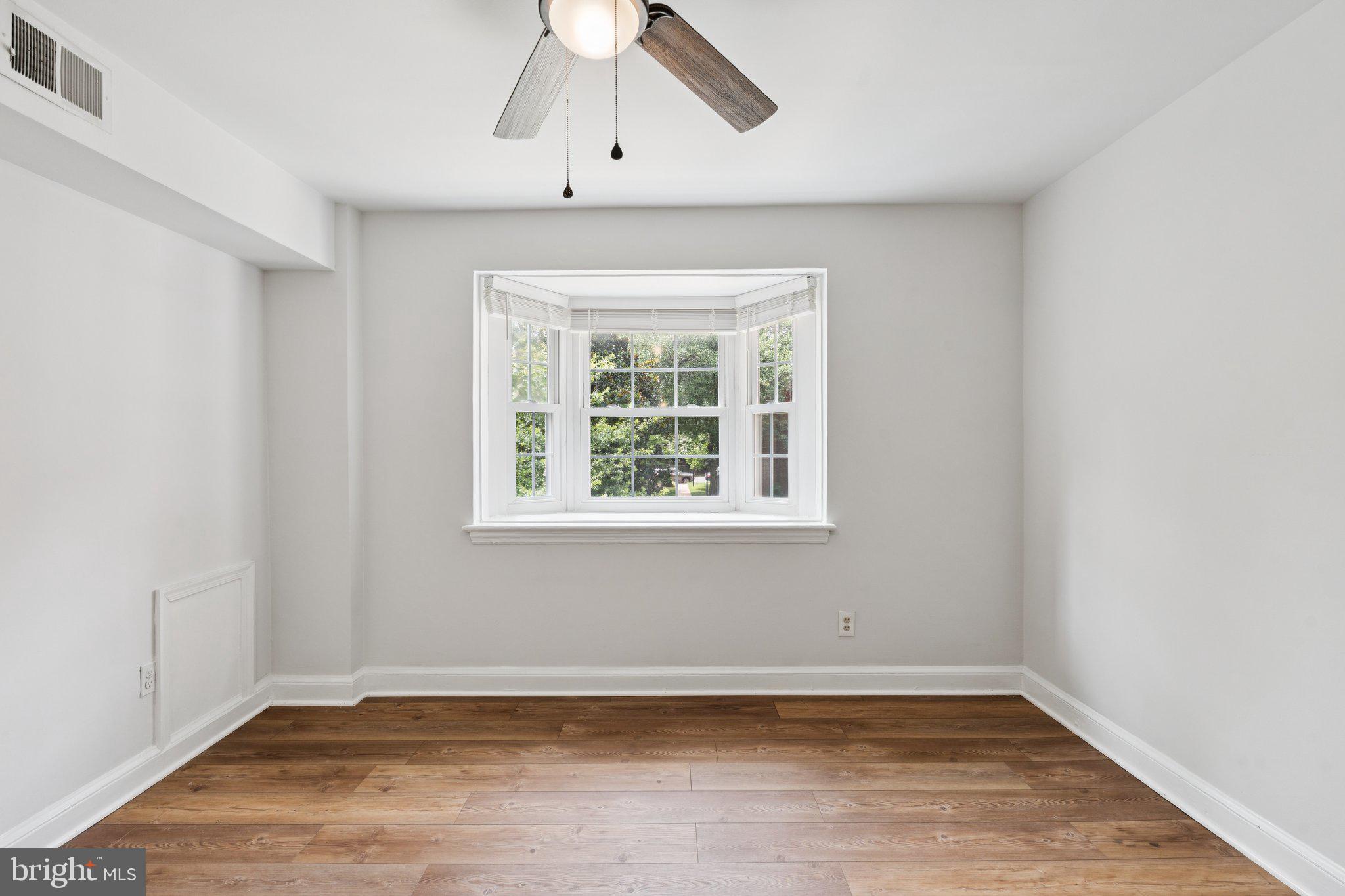 2107 North Scott Street, Unit 70 Arlington, VA 22209 - Photo 15 of 19 an empty room with a window