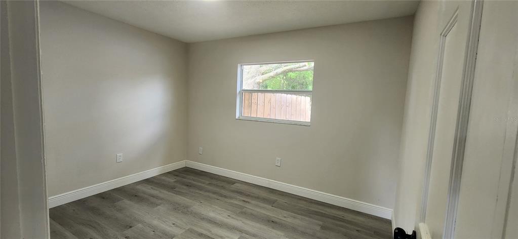 614 Huntington Street Brandon, FL 33511 - Photo 13 of 16 an empty room with a window