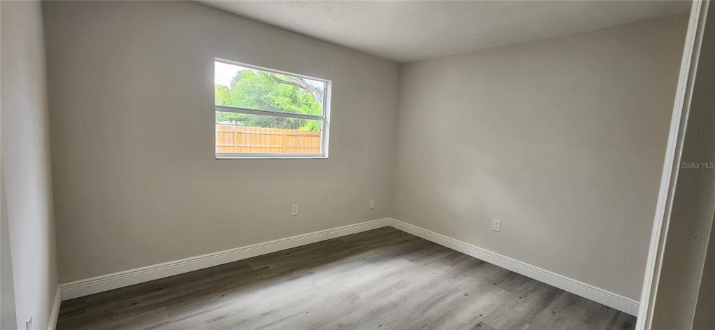 614 Huntington Street Brandon, FL 33511 - Photo 14 of 16 an empty room with a window