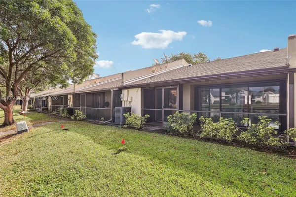 a view of a lake with a garden