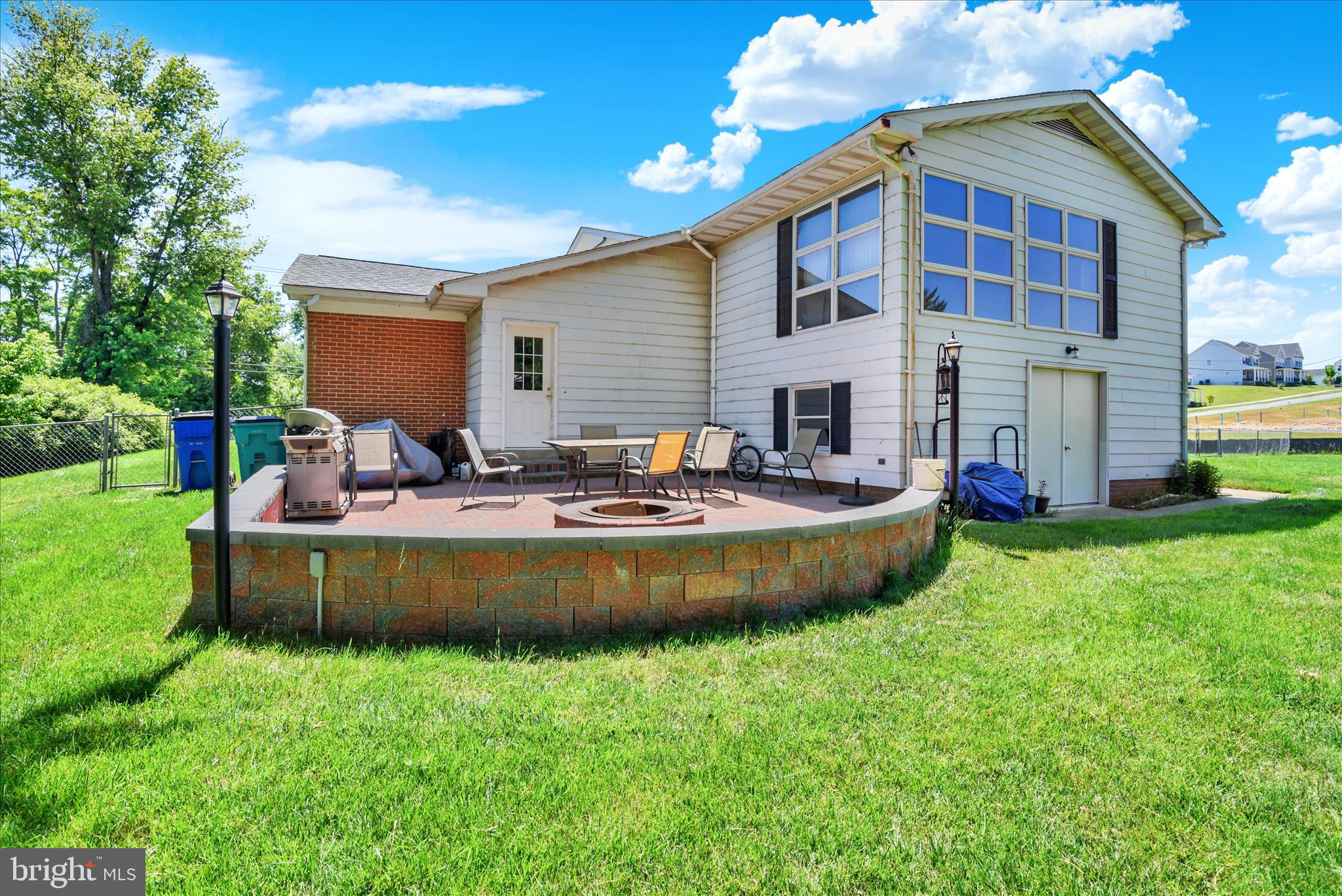 6742 Mt Phillip Road Frederick, MD 21703 - Photo 26 of 27 Nice stone patio with fire pit.