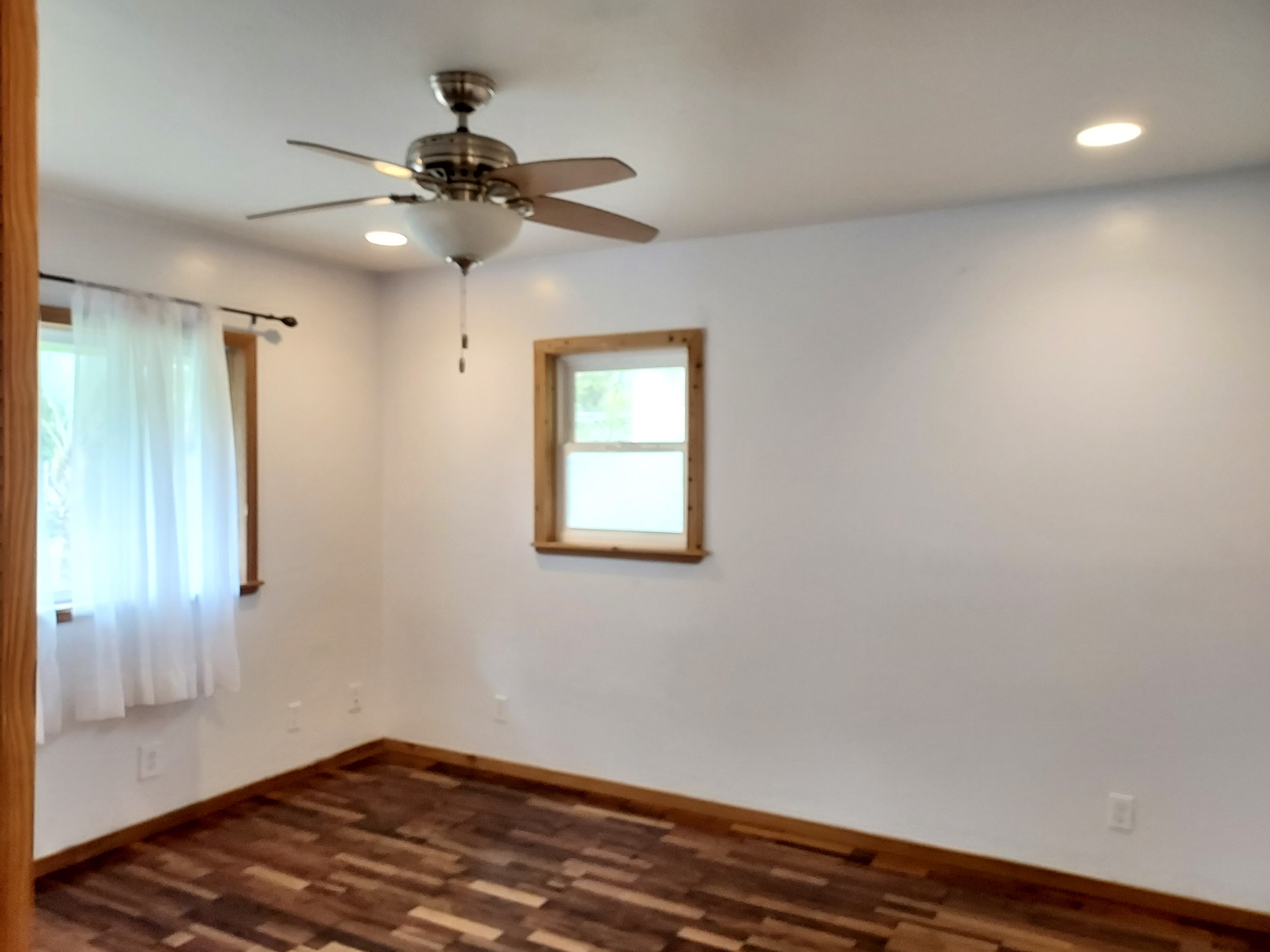 14-3431 Seadrift Road Pahoa, HI 96778 - Photo 14 of 22 wooden floor in an empty room with a window