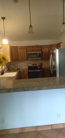 a living room with hard wood flooring