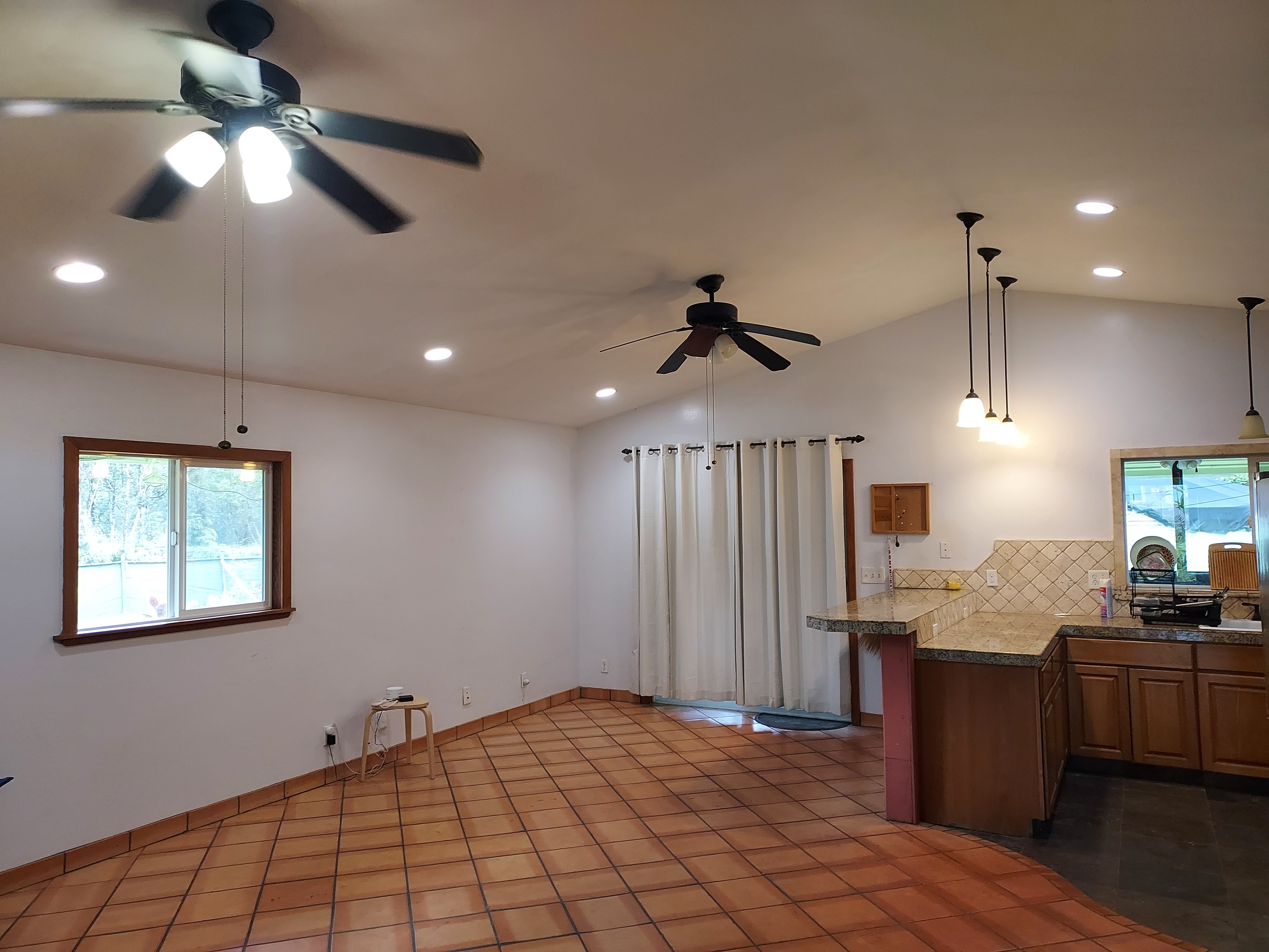 14-3431 Seadrift Road Pahoa, HI 96778 - Photo 8 of 22 a view of a kitchen with a sink refrigerator and window