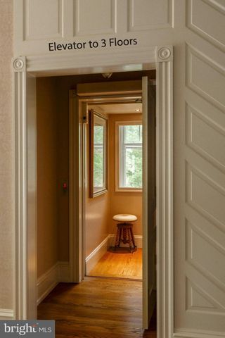 a view of a livingroom with furniture and a window