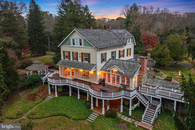 a front view of a house with a porch