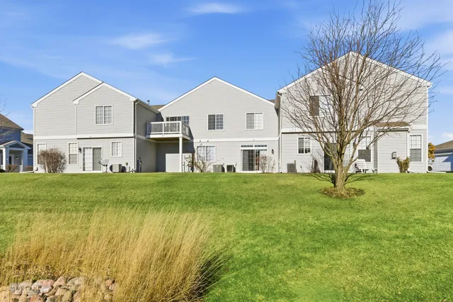 a view of a living room and a livingroom with furniture
