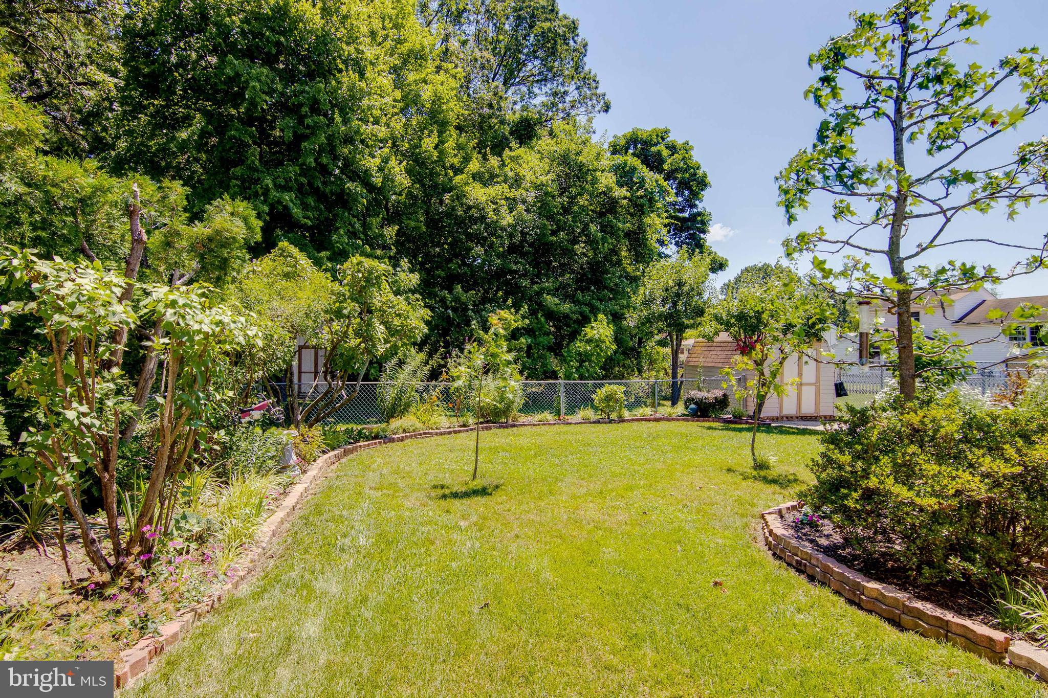 5 Tulip Tree Court Baltimore, MD 21221 - Photo 35 of 40 Room to run in fenced rear yard