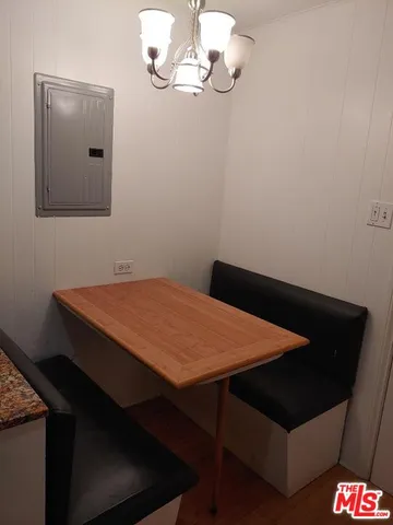 a bathroom with a tub and shower