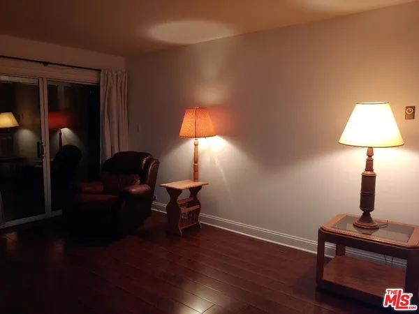 a bathroom with a sink a mirror and a toilet